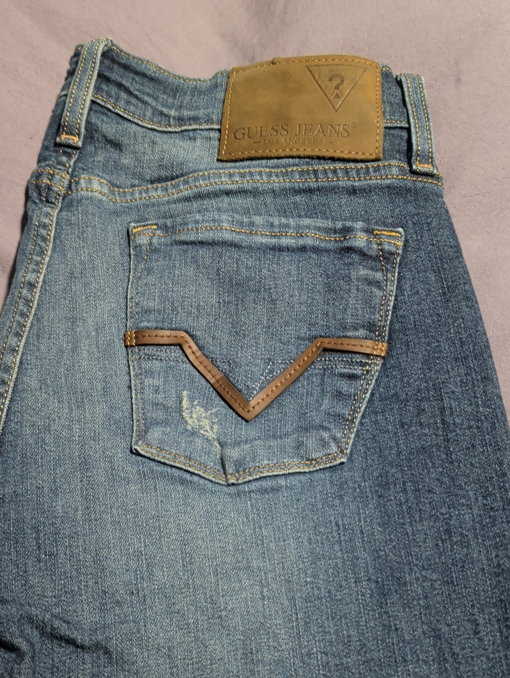 GUESS Men's Straight Blue Denim Jeans with Brown Trim